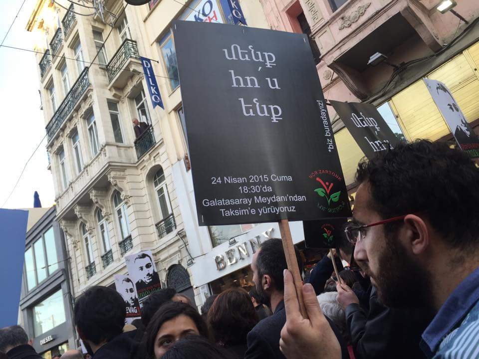 A placard says "We are still here," Istiklal Street, Istanbul (photo by Rupen Janbazian)